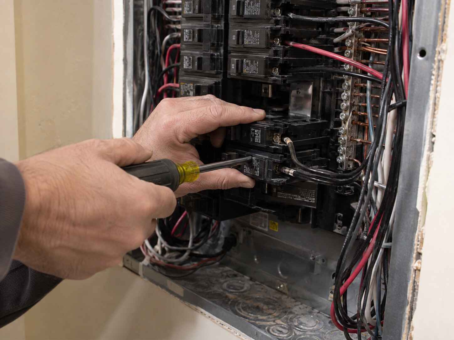 Electrician performing residential electrical work in a Doylestown, PA home